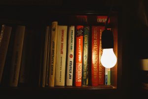 White LED shines on a stack of books