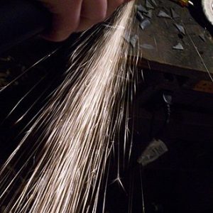 Photo of sparks of mild steel from a grinder